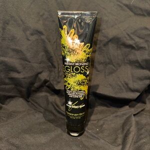 Designer skin instant bronzing gloss